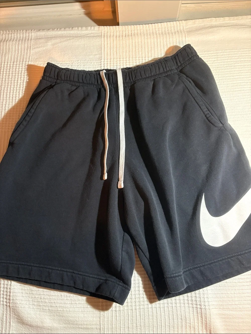 Nike Black Athletic Shorts with White Swoosh